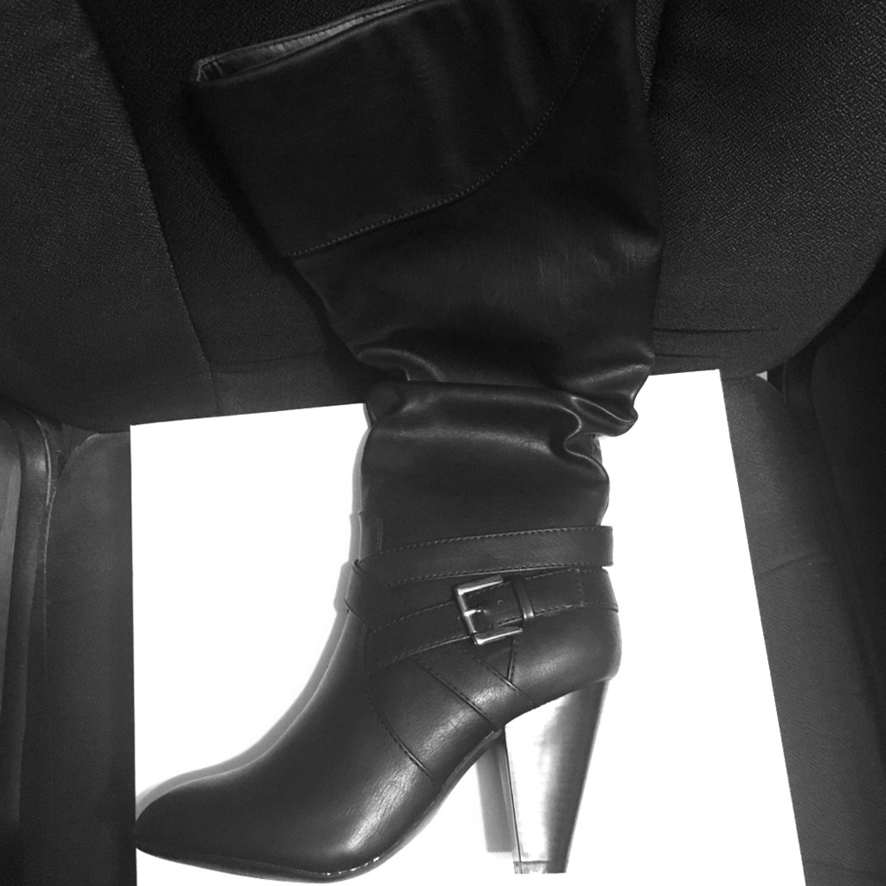 Brand new black heeled boots